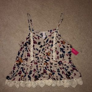 Never worn before floral loose tank top